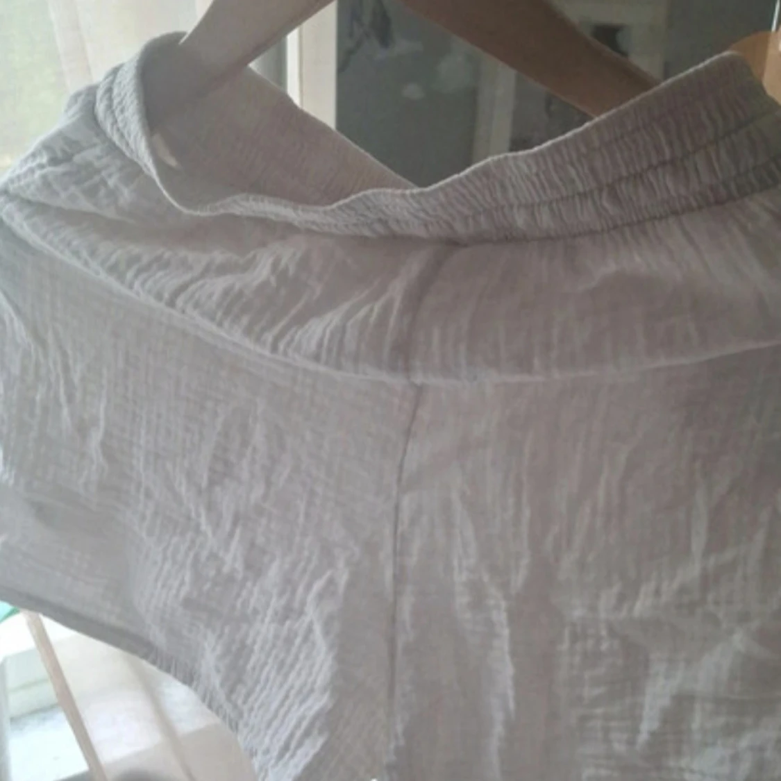 Vita linnedshorts med snörning XS - 2