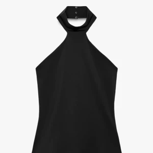 Svart halterneck topp - Snygg svart halterneck topp, aldrig använd! Xs-S