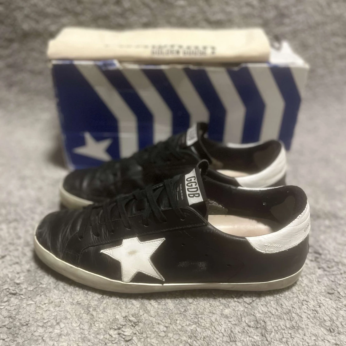Golden Goose svarta sneakers med vit stjärna