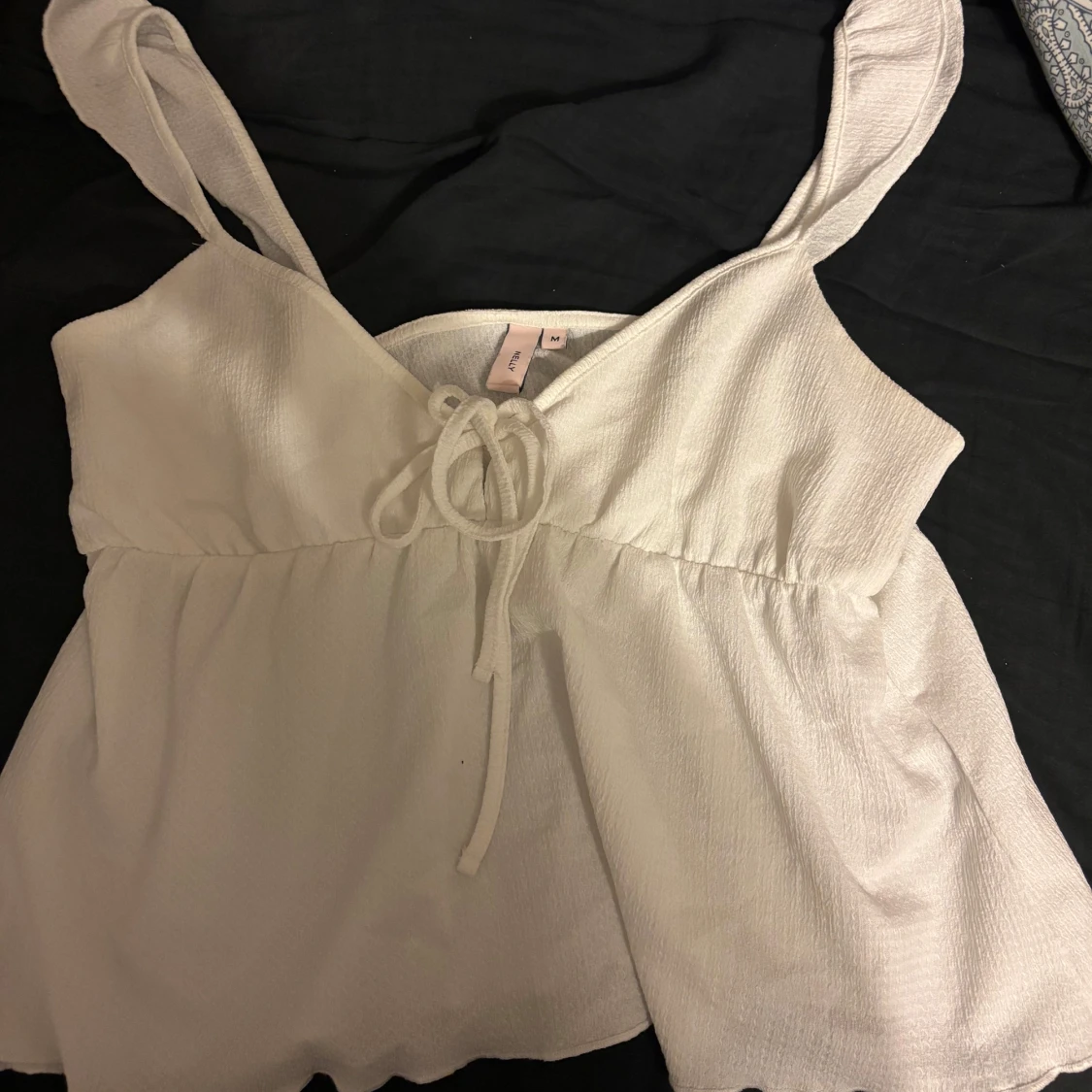 Vit linnetopp från Nelly  - 1