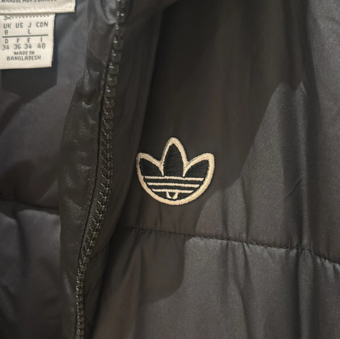 Svart dunjacka från Adidas - 1