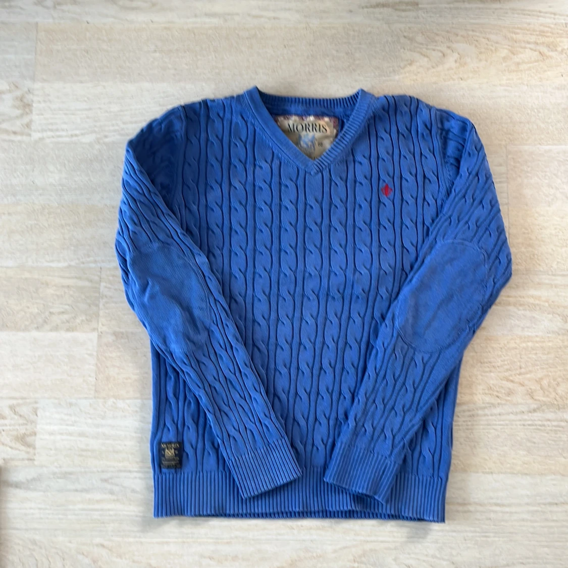 Blå stickad tröja från Morris