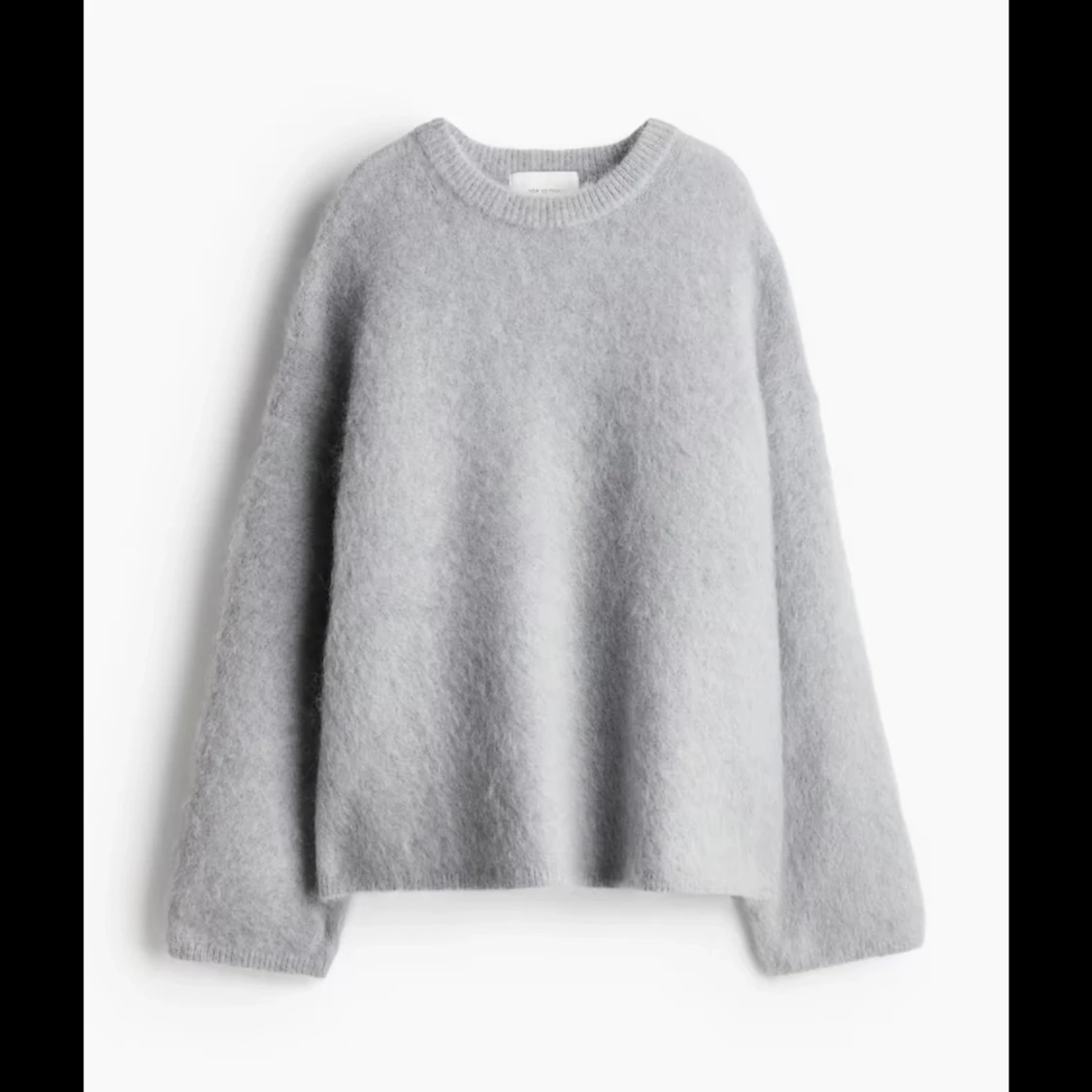 Grå stickad tröja