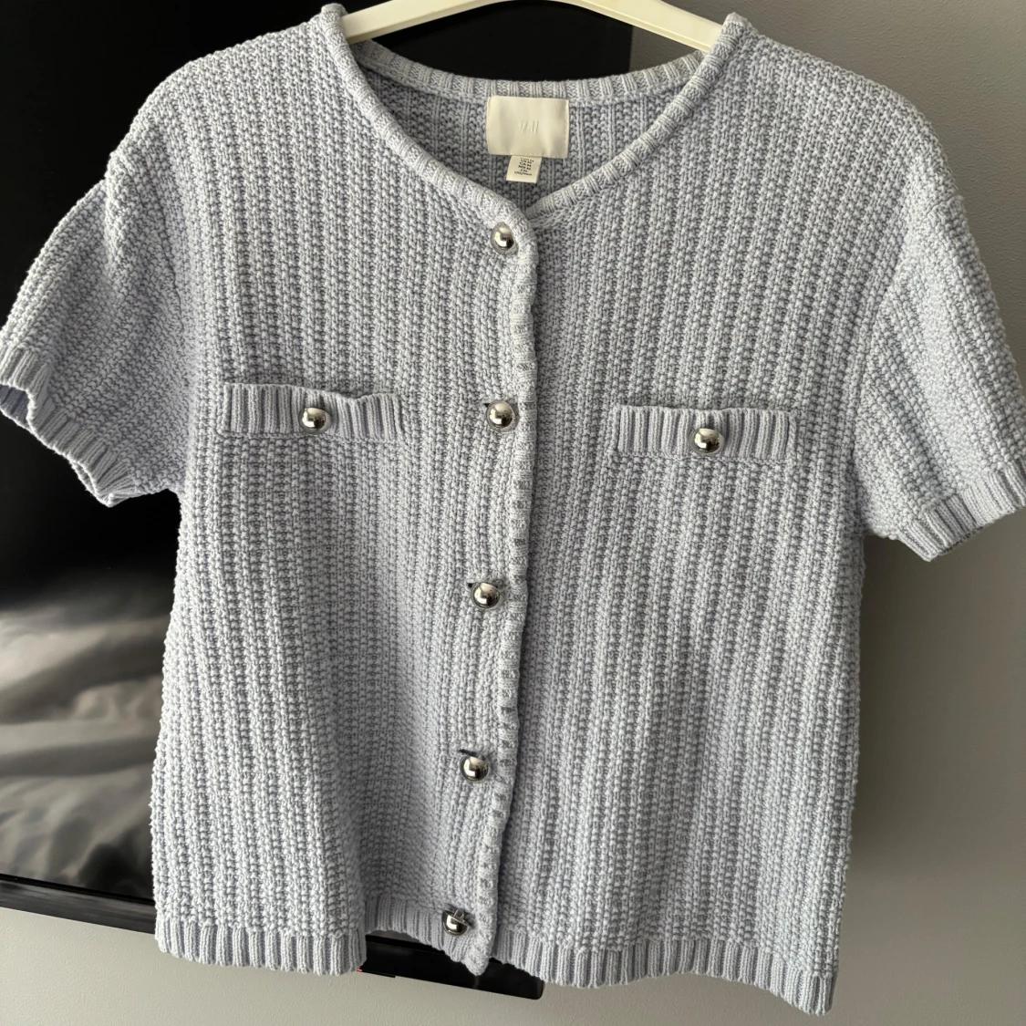 Ljusblå kortärmad tröja