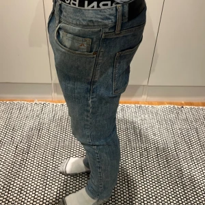 J Lindberg jeans  - Ljusblåa jeans från j Lindberg. Storlek w30 L32. Inte använda dvs inga defekter eller annat. Skriv för frågor o funderingar