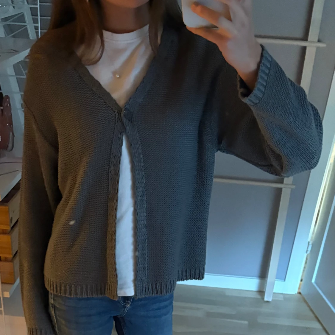 Grå stickad kofta från Passport