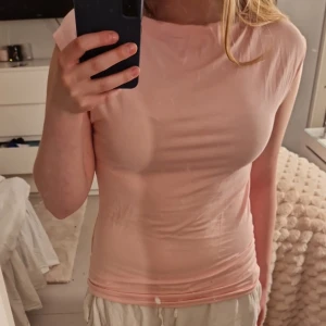 Ljusrosa topp - En fin topp från lager157, har inte använts och kommer förmodligen inte användas så jag säljer den istället. Satt pris gäller. 💕