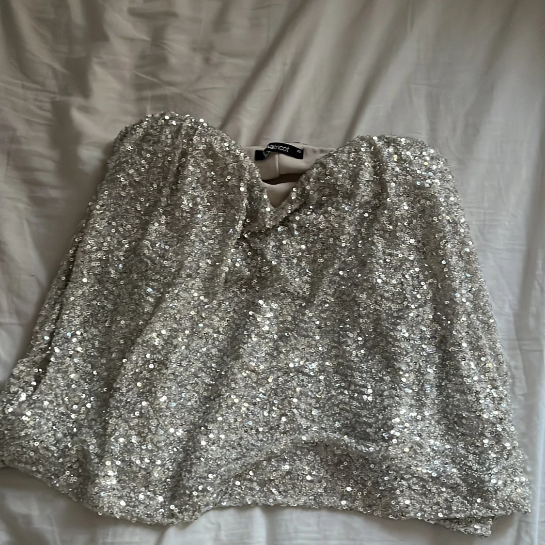 Silver glittrig tubtopp från Gina Tricot