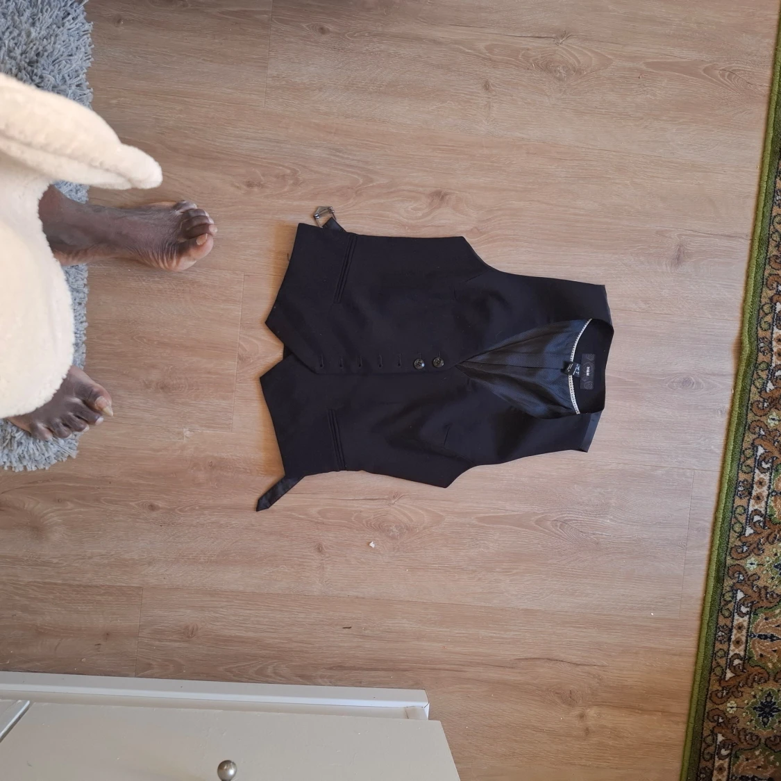 Svart kostymväst med knappar