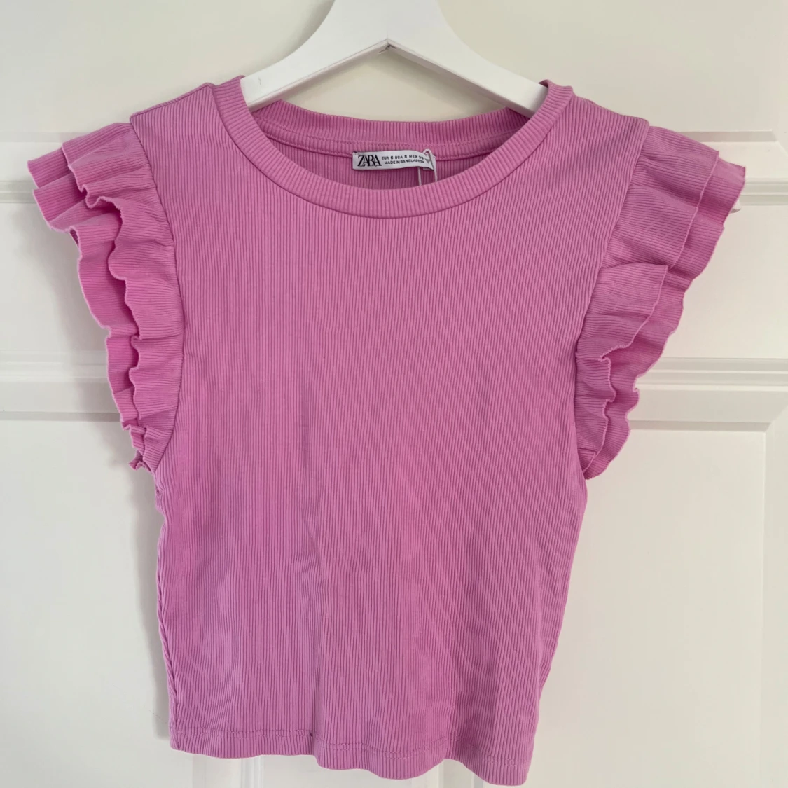 Rosa topp med volangärmar från Zara