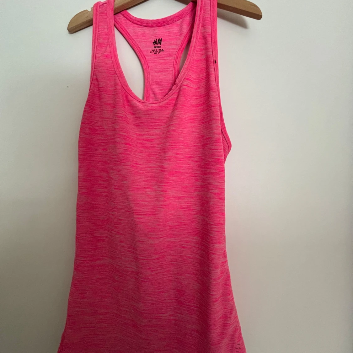 Rosa sportigt linnetopp från H&M