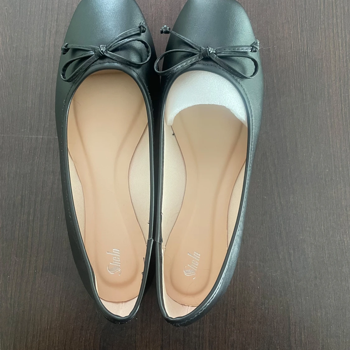 Svarta ballerinaskor med rosett