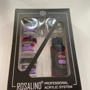 Rosalind Professional Acrylic System - Säljer ett komplett akrylsystem från Rosalind. Setet innehåller tre burkar med akrylpulver och en flaska akrylväska på 30 ml. Perfekt för att skapa hållbara och snygga naglar hemma. Inkluderar även en glasbehållare för enkel applicering. Jag har endast testat den rosa 