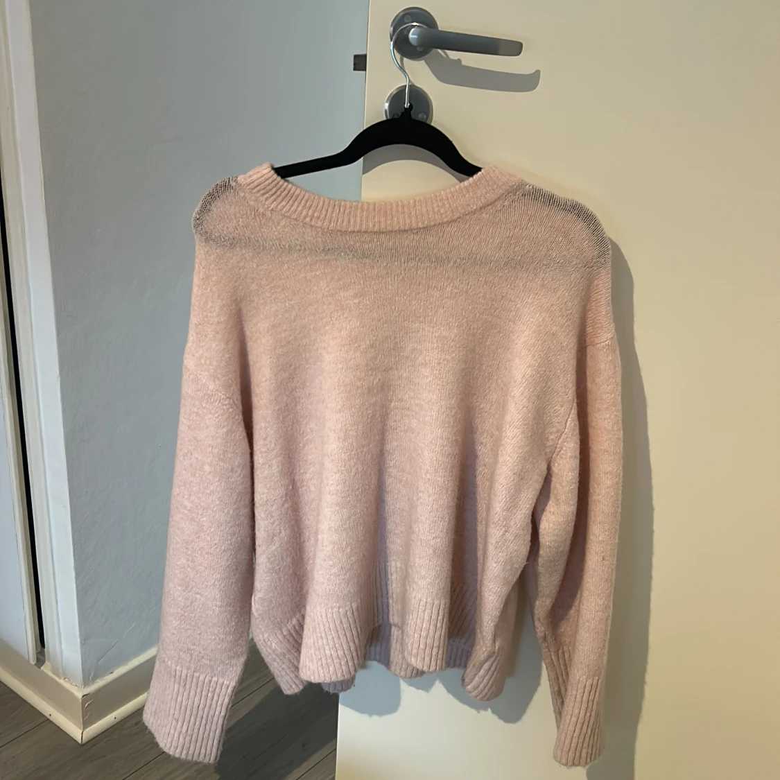 Ljusrosa stickad tröja med ribb