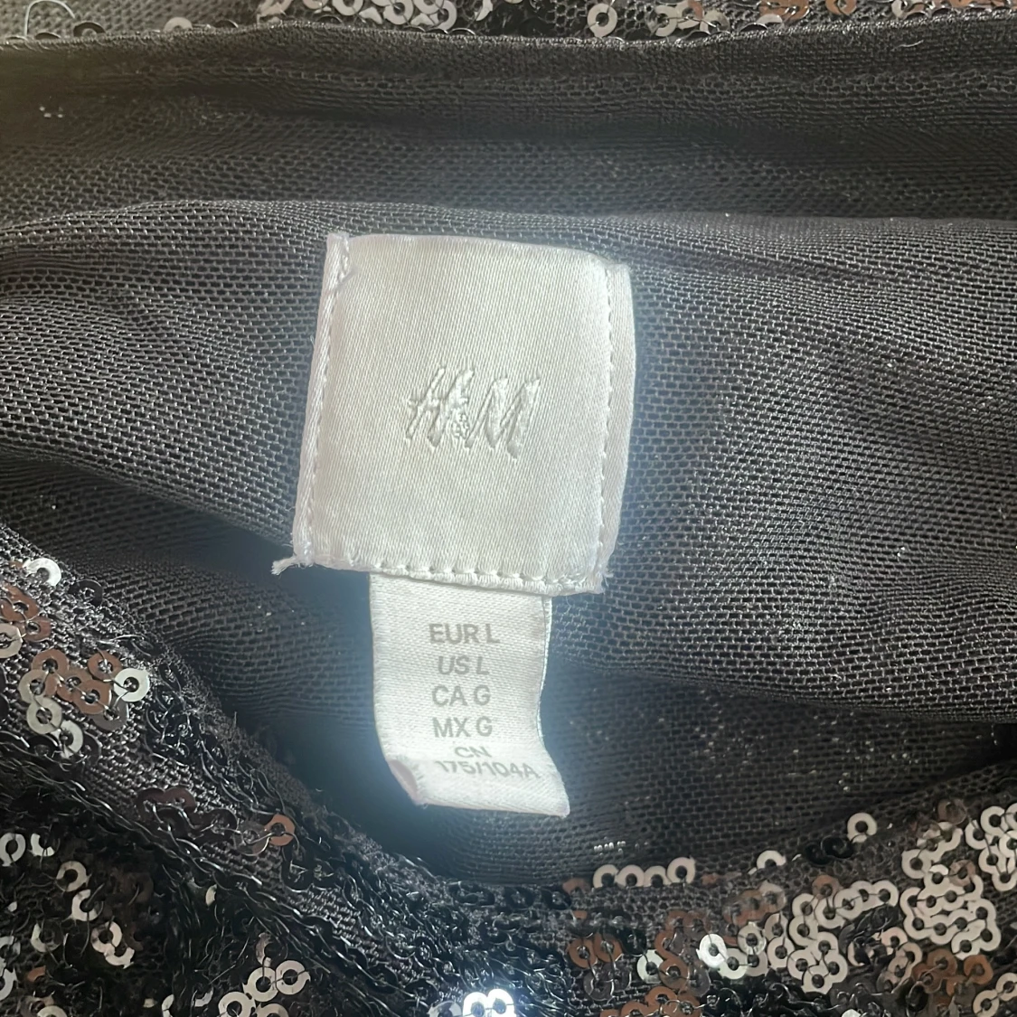 Svart paljettopp från H&M - 2