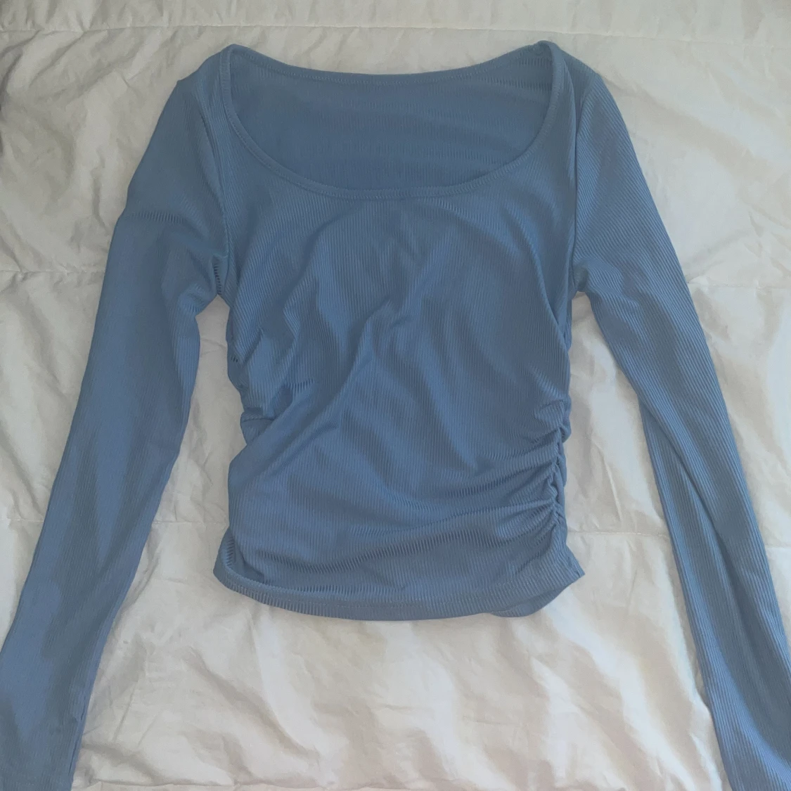 Ljusblå ribbad långärmad topp