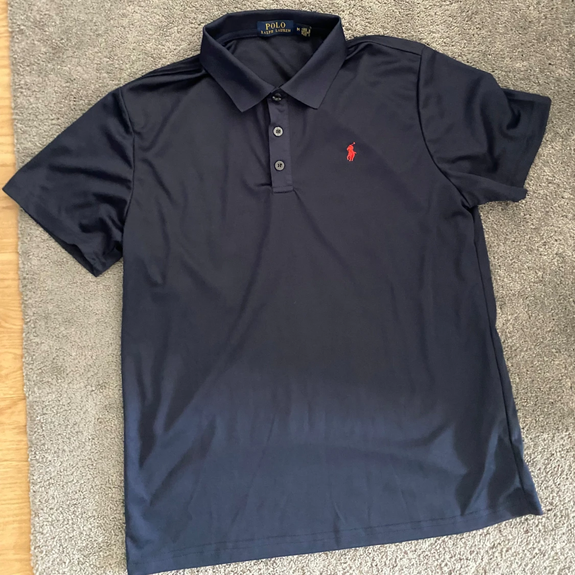 Mörkblå pikétröja från polo ralph lauren