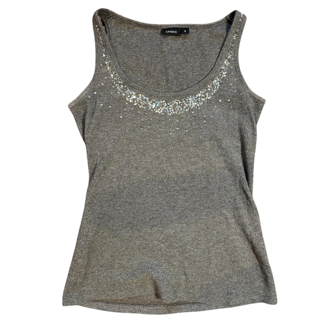 Glittrigt paljett linne från Lindex  - 1