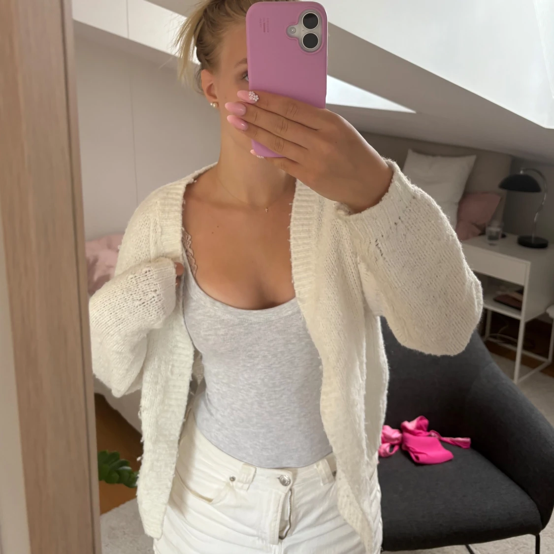 Vit stickad väst från AWARE XS