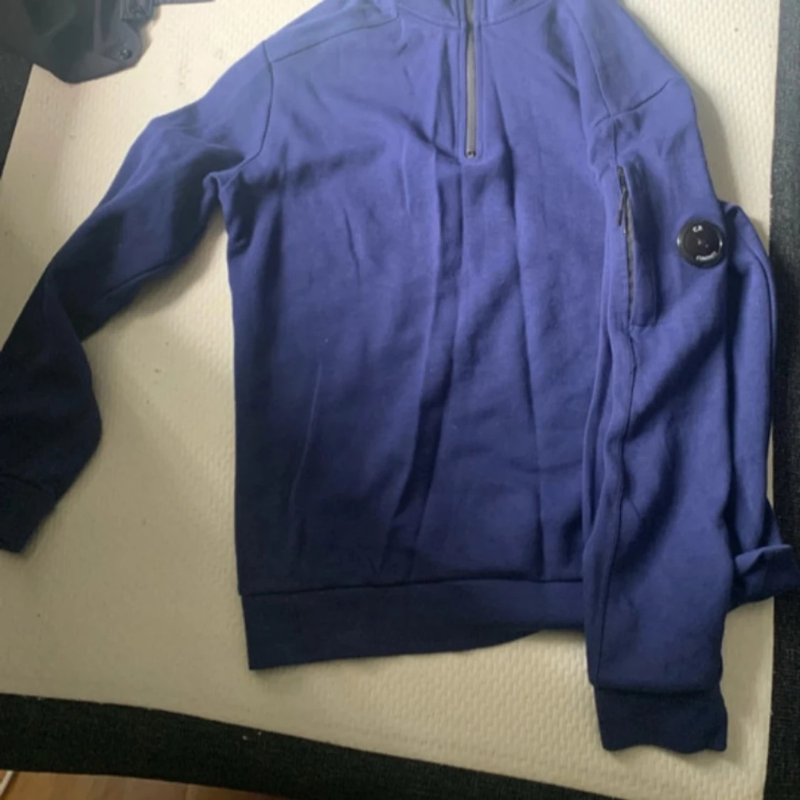 Blå half zip tröja från C.P. Company