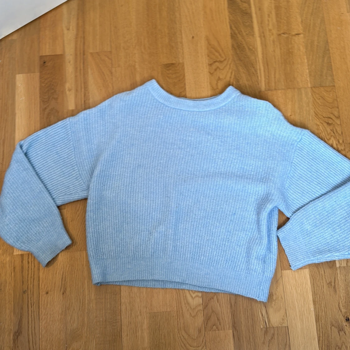 Ljusblå stickad tröja från Firefly