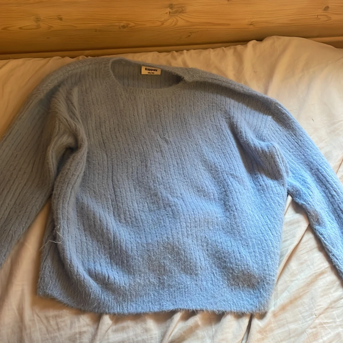 Ljusblå stickad tröja från Kappahl