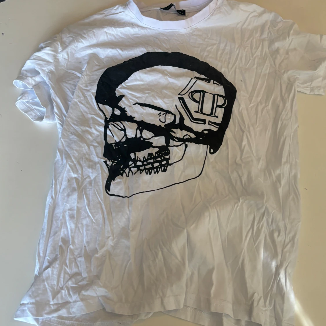 Filip Plain Vit t-shirt med dödskalletryck från Philipp Plein