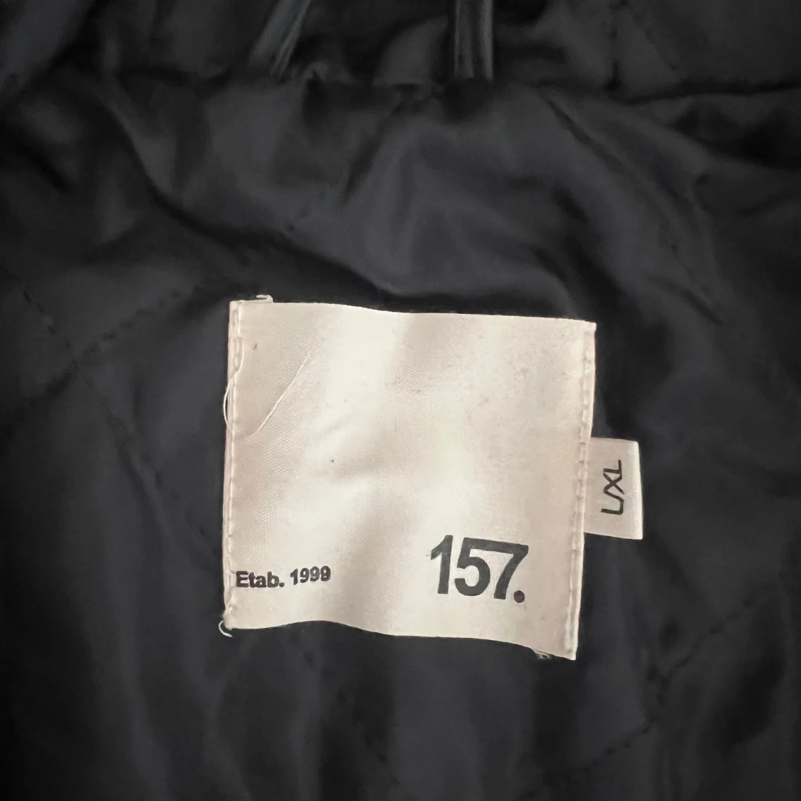 Svart regnjacka från 157 - 2