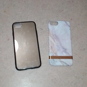 Iphone 8 skal - Säljs i paket 50:-  Spegel skal och ett vitt marmor skal