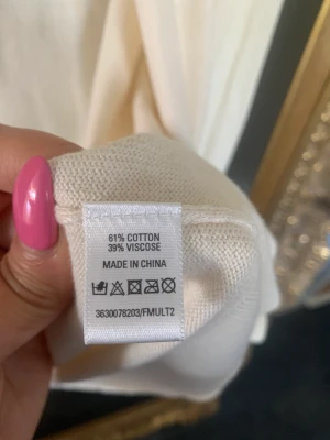 Tröja - Cardigan med stenar 