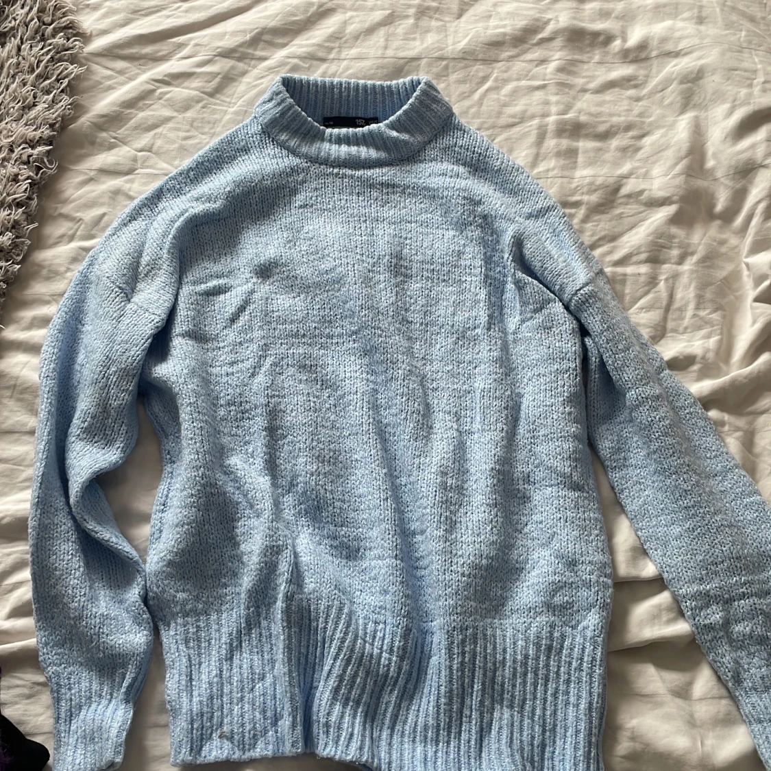 Stickad tröja
