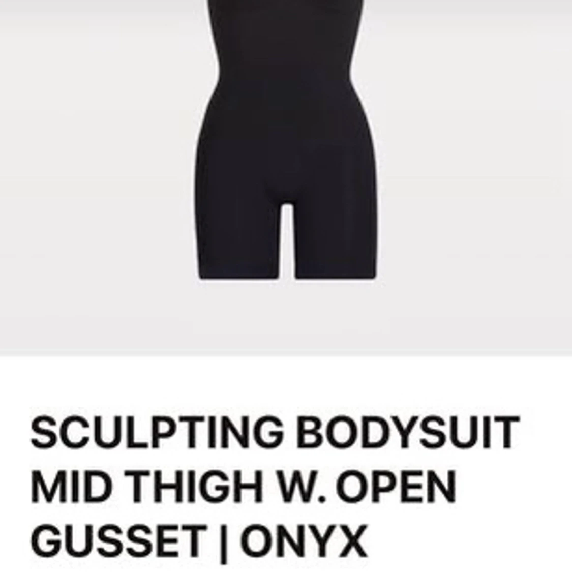 Sculpting bodysuit mid thigh with open gusset