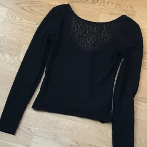 Spetstopp - Svart spetstopp, bra skick.