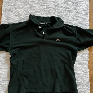 Lacoste piké  - Bra skick och inte mycket använd