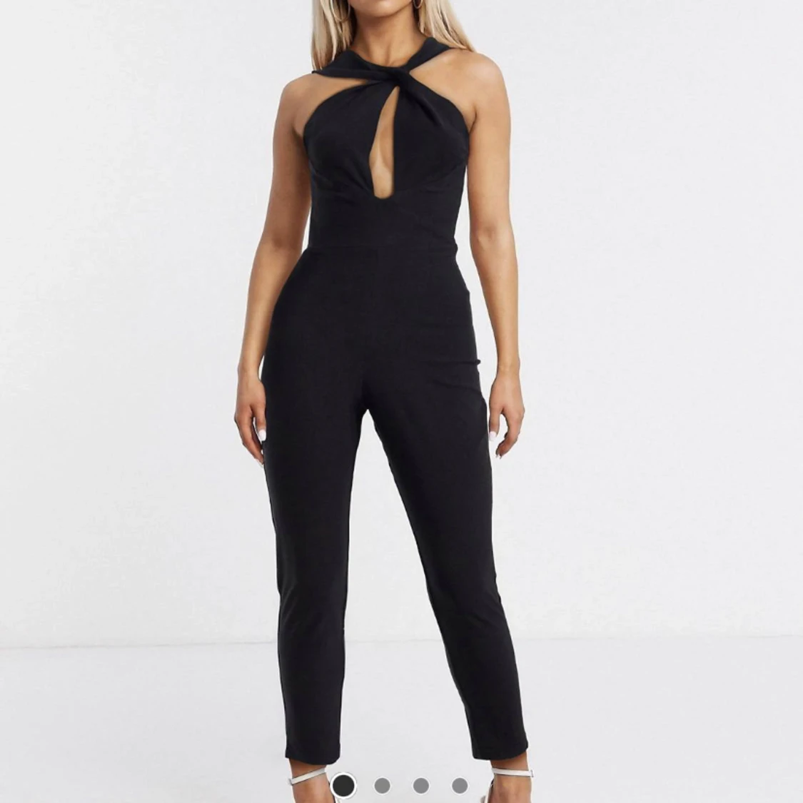 Svart jumpsuit/byxdress i strl 36