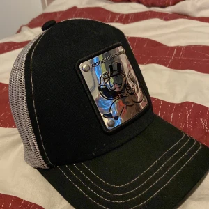 Monopol keps - Fin money on my mind keps köpt på hatstore använd ett fåtal ggr😃