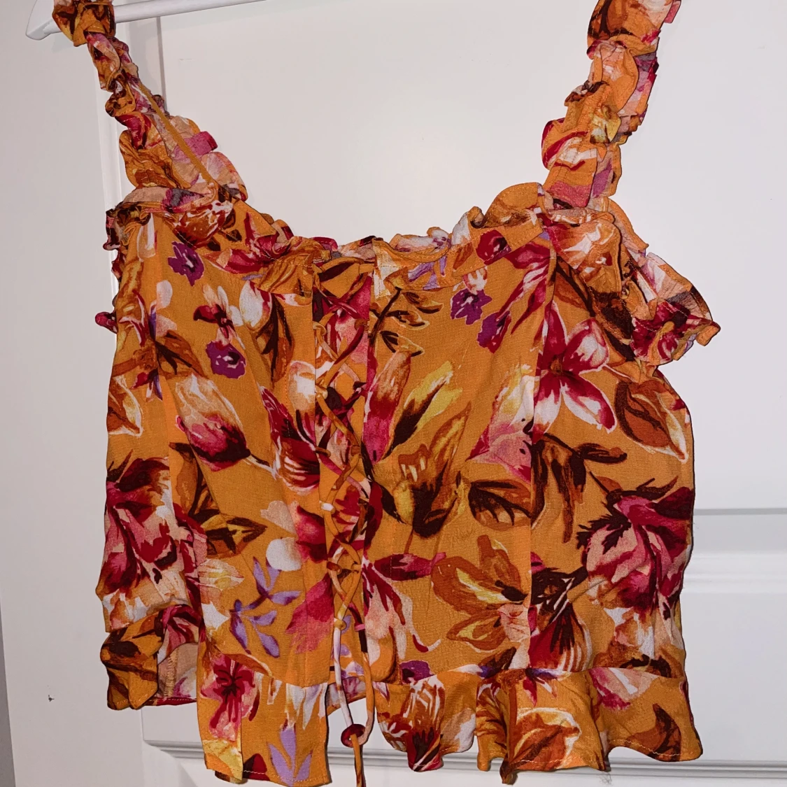 Orange blommig topp - 90