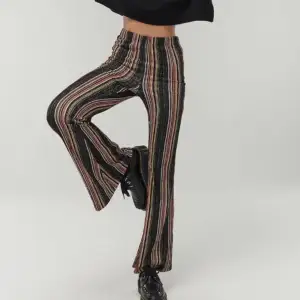 Striped flares from Australian brand Ghanda. In great condition like new, barely worn.