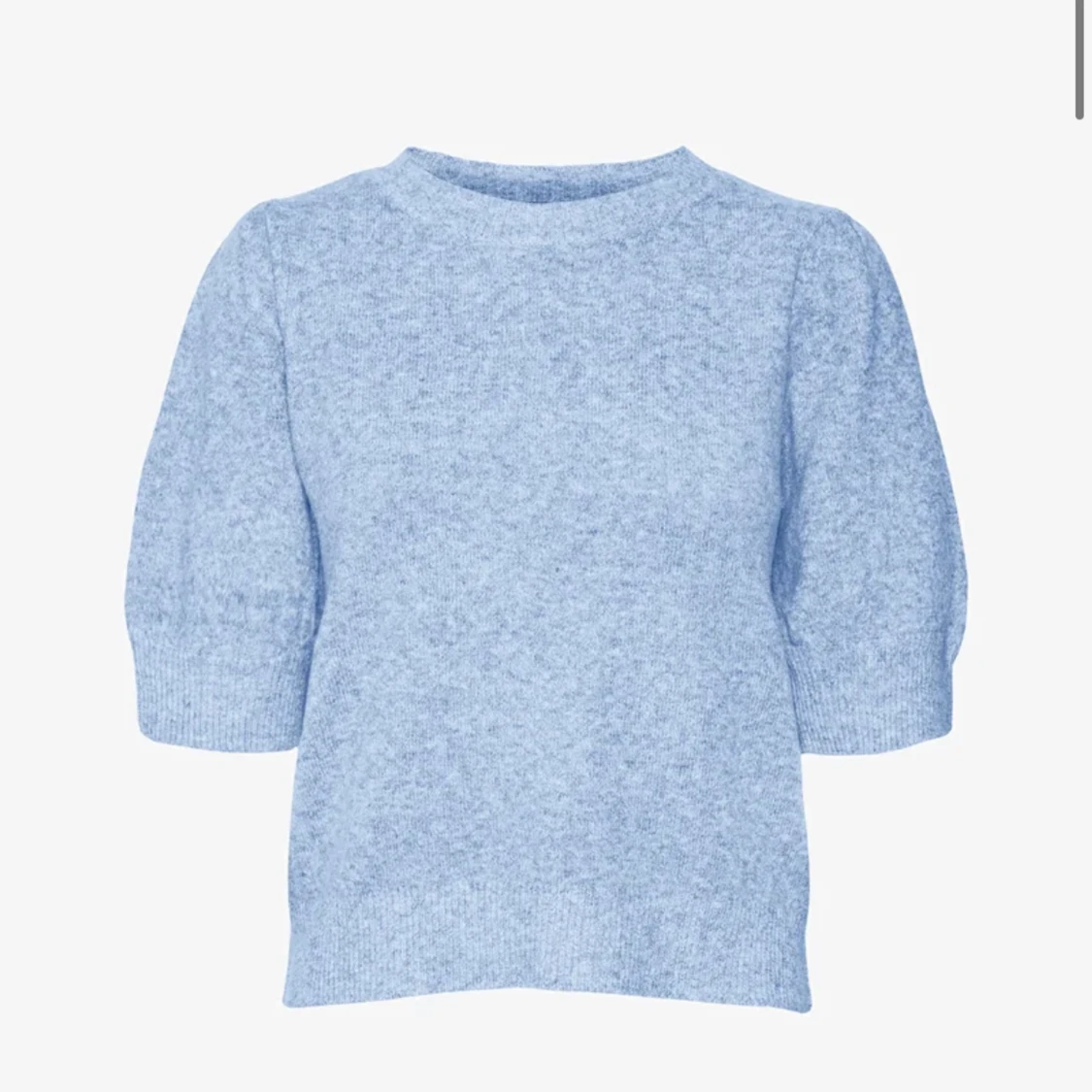 Blå stickad T-shirt