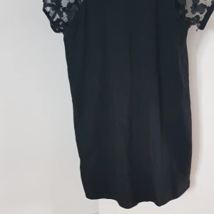 Klänning - Fin svart klänning.  Använt bara några gånger. Storlek 140