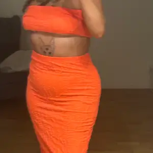 Orange kjol & top set, super skönt och stretchigt material! 