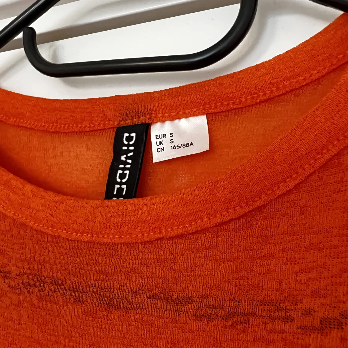 Genomskinlig orange tröja - 90