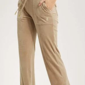 Juicy byxor - Superfina juicy byxor med guldiga detaljer! Helt som nya använda ca 3 gånger köpta i våras💗