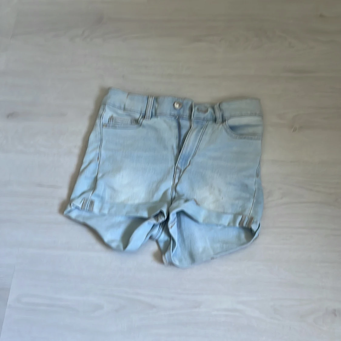  Ljus blåa shorts 