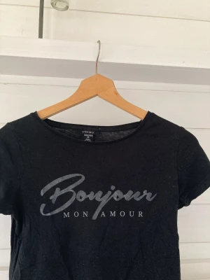 Bonjour - Svart tröja med silvriga detaljer