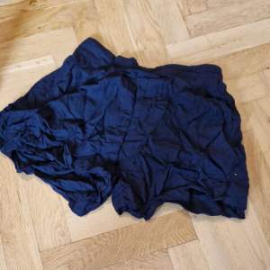 Short black shorts, EU size 36, elastic in the back for a snug fit 