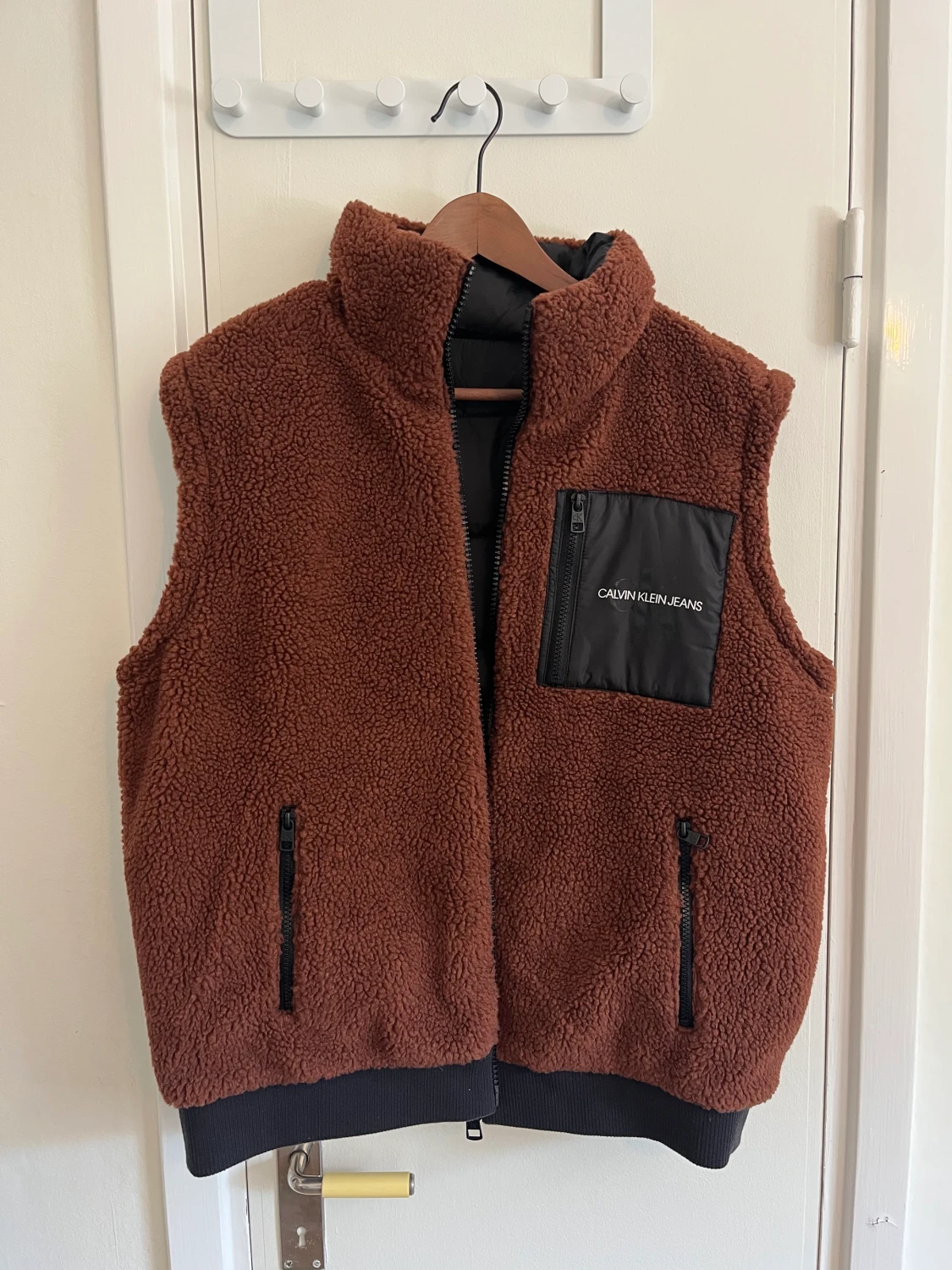 Vändbar fodradväst 