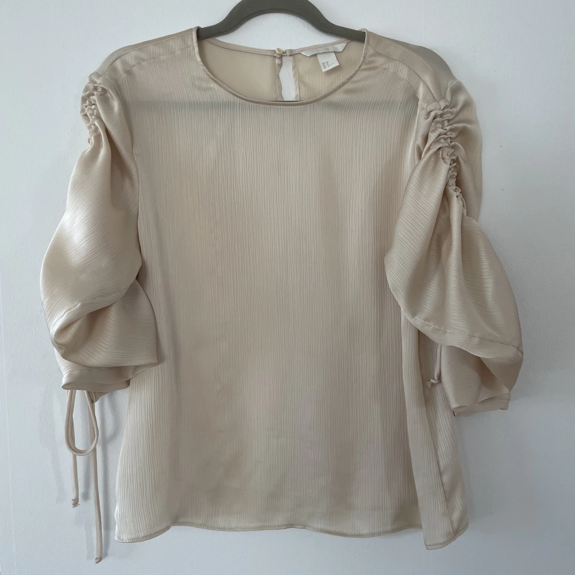 Skimmrig blus från H&M strl 38