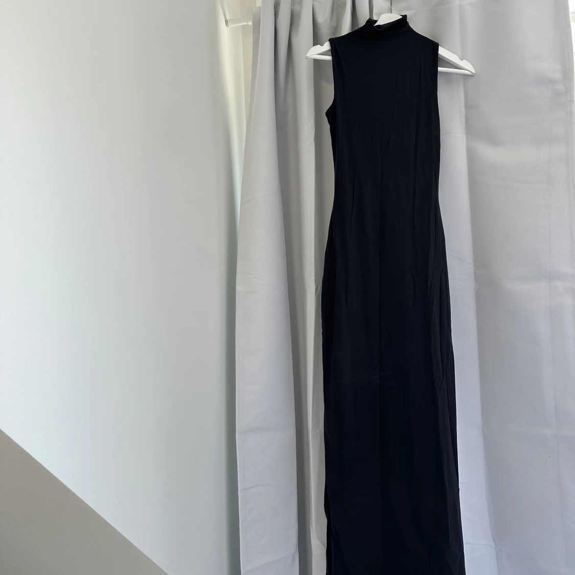 Oanvänd skimsklänning