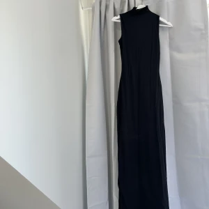 Oanvänd skimsklänning - Skimsklänning, Helt oanvänd. Har prislappen kvar. Köp direkt för 800kr eller buda